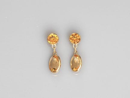 Ein Paar Ohrringe aus 750°/°° (18 K) Gelbgold, bes