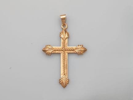 750°/°° (18K) gold cross, with the arms adorned wi