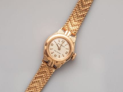 MOVADO, small ladies' watch in 750°/°° (18K) yello