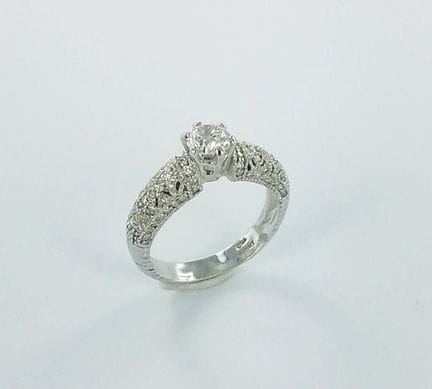 Bague or gris 750 millièmes sertie d'un diamant (e