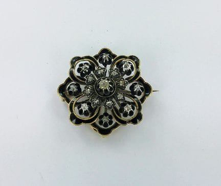Brosche aus 375er Gold, besetzt mit Emaille und Ro