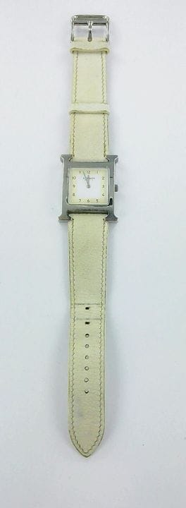 爱马仕（HERMES），H.
钢制表壳，皮革表带，石英机芯。