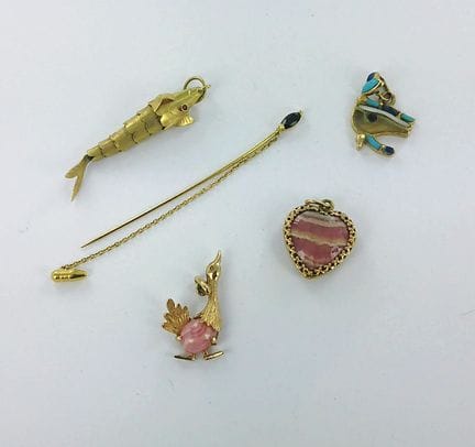 Set di gioielli in oro 750 composto da: una spilla
