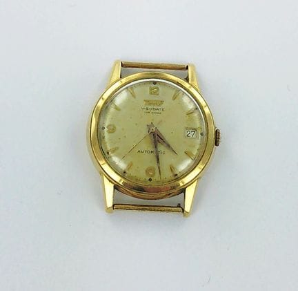天梭（TISSOT），Visodate自动款。
750千分之一纯金男表，米色珐琅表盘，配有阿拉伯数字