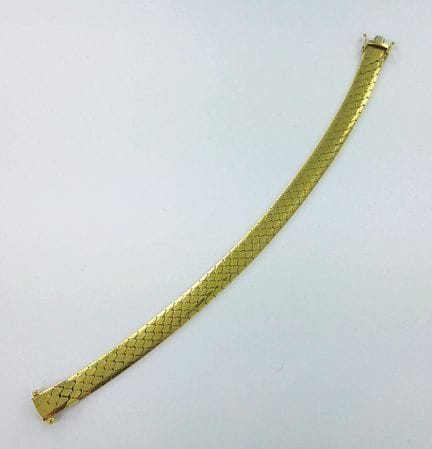 Bracelet souple or 750 millièmes à motif d'écaille