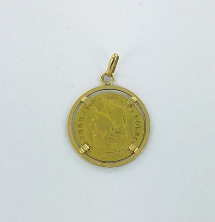 Ciondolo a forma di moneta da 10 franchi d'oro del