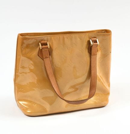 Louis VUITTON
Bolso modelo «Houston» de piel charo