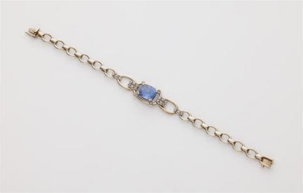 Lotos
A German 18k white gold diamond and Ceylon s