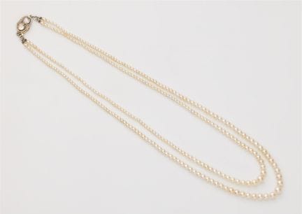A Belle Epoque two row Oriental pearl necklace wit