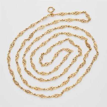 A long 14k gold Art Nouveau sautoir chain.

Long, 