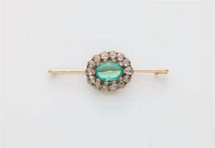 A 14k gold bar brooch with a 19th century rose-cut