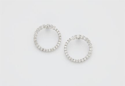 A pair of 18k white gold and diamond loop stud ear