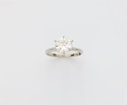 A platinum and brilliant-cut diamond solitaire rin