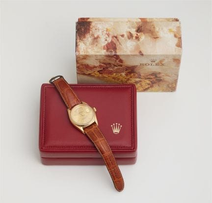 Rolex SA
An 18k gold Rolex Day Date wristwatch.

R