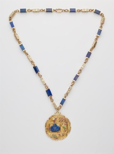 An 18k gold lapis lazuli sautoir necklace with a l