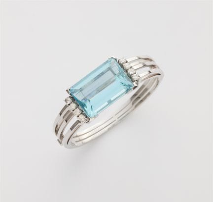 An 18k white gold diamond and large step-cut aquam