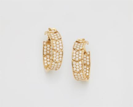 Cartier
A large pair of French 18k yellow gold and