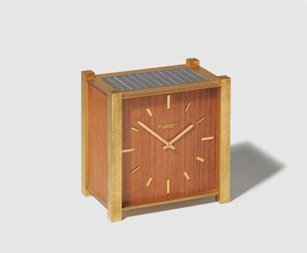 Patek Philippe SA
A fire-gilded brass and wood Pat