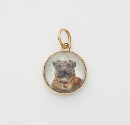 An 18k gold mother of pearl and Essex Crystal inta