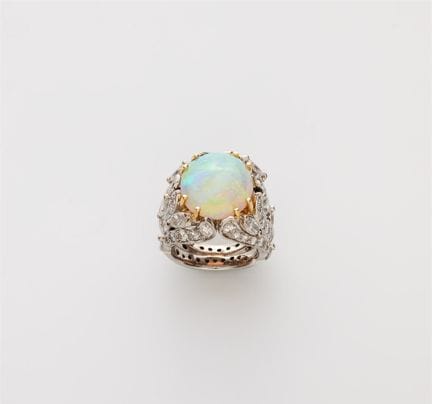 René Kern
An 18k gold diamond and opal cabochon co
