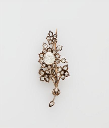 A 14k gold silver and diamond naturalistic floweri