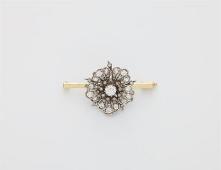 A 14k white gold and diamond wild rose blossom lat