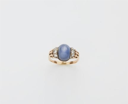 A 14k red gold diamond and star sapphire Retro Sty