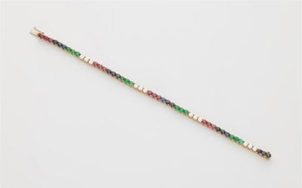 An Italian 18k white gold ruby sapphire emerald an