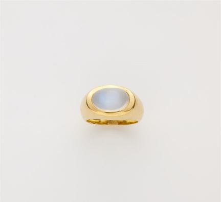 A German 18k gold and moonstone cabochon band ring