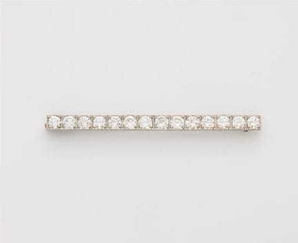 A platinum and brilliant-cut diamond Art Déco bar 