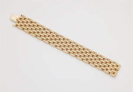 Cartier
A French 18k yellow gold and diamond "Mail