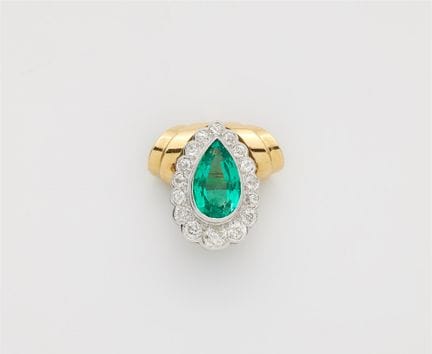 An 18k gold pendant using a platinum diamond and C
