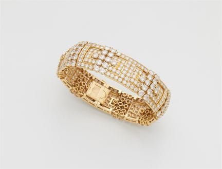Cartier
A French 18k yellow gold and diamond cuff 