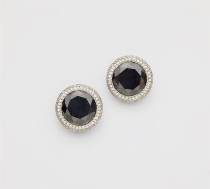 A pair of 18k white gold black & white diamond cli