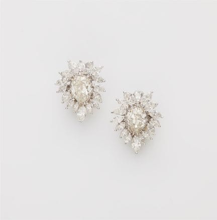 René Kern
A pair of 18k white gold and diamond coc