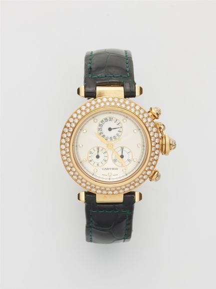 Cartier
An 18k gold and diamond Cartier Pasha Ref 