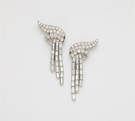 A pair of platinum and diamond cascade earrings la