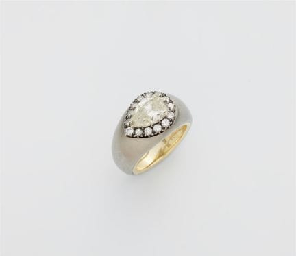 A brushed steel yellow gold and pear-cut diamond s
