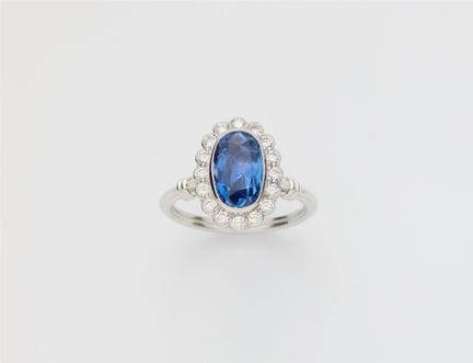 A 14k white gold diamond and natural Ceylon sapphi