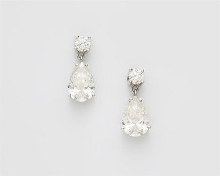 A pair of 18k white gold and diamond earrings with