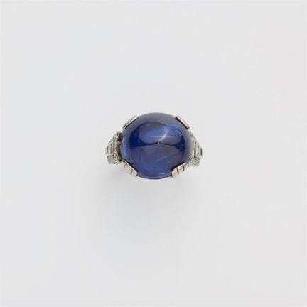 A rhodium plated 18k gold diamond and sugarloaf-cu