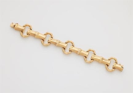 An Italian textured 18k rose gold bamboo chain bra