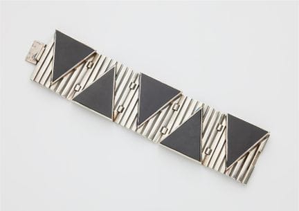 Jean Després
A French silver and triangular onyx p