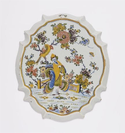 Assiette décorée d'une chinoiserie

Faïence, décor