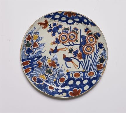 Assiette représentant un jardin chinois

Faïence, 