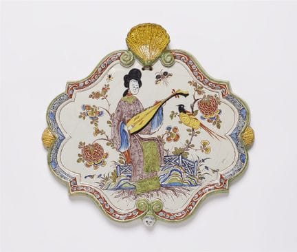 Assiette décorée d'une chinoiserie

Faïence, décor