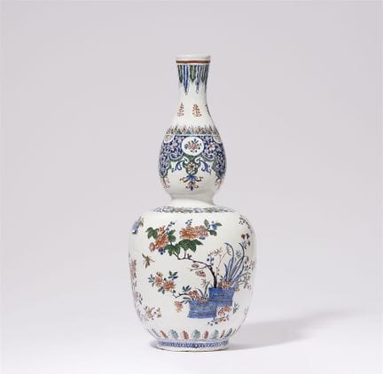 Grand vase double en forme de citrouille

Faïence,