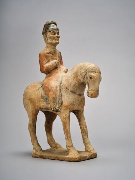 TANG DYNASTY (618–907) - CHINA
A dignitary seated 