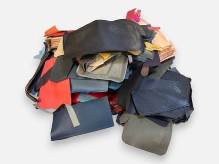 [LEATHER HANDLE]
Box containing assorted leather s
