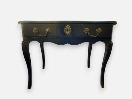 Bureau en bois noircit ouvrant par un tiroir en ce
